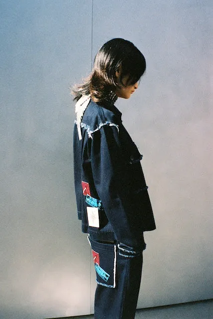 Distressed Denim Trucker Jacket