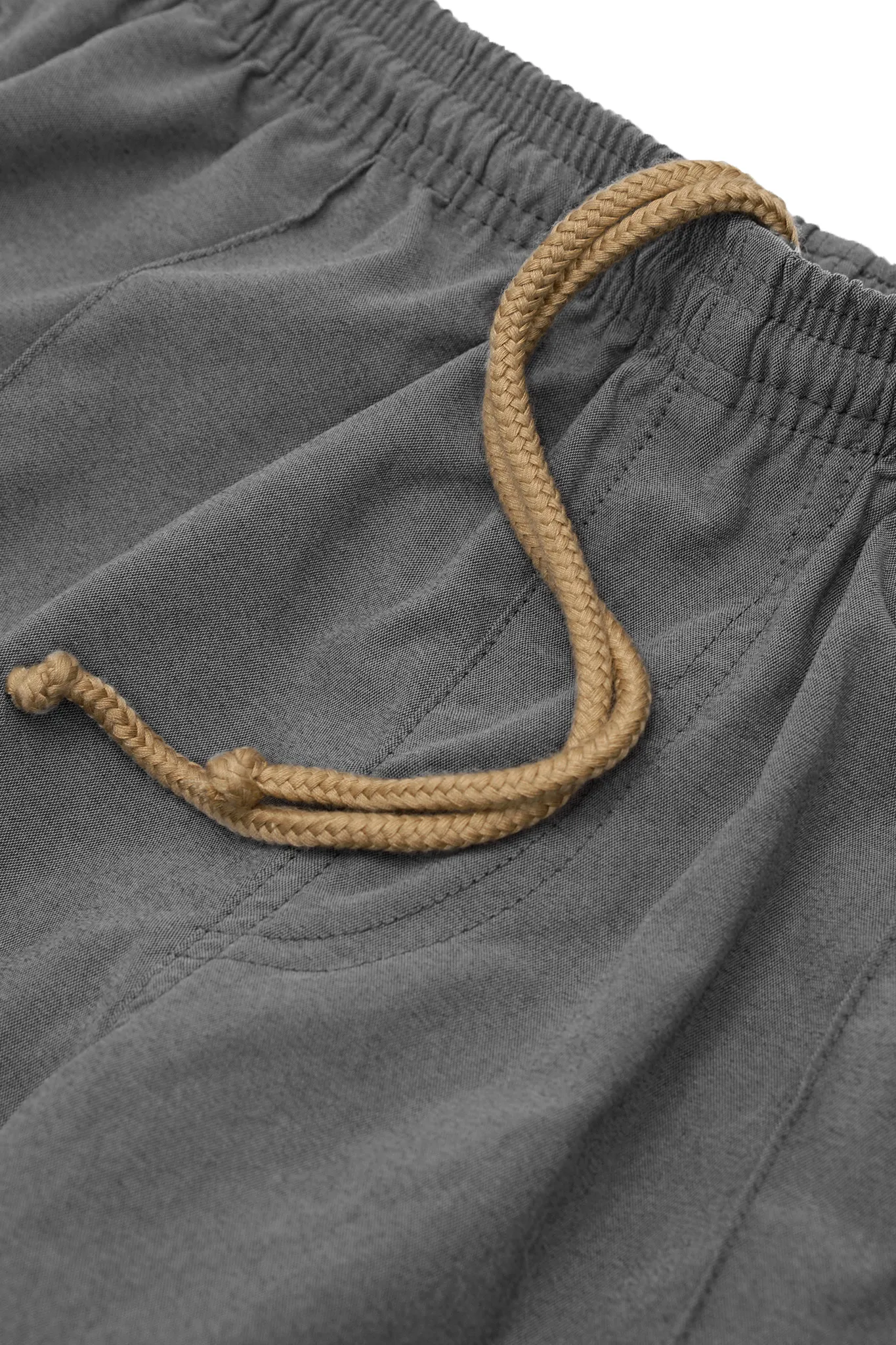 PLEATED HOUSE SHORTS IN STONE GREY