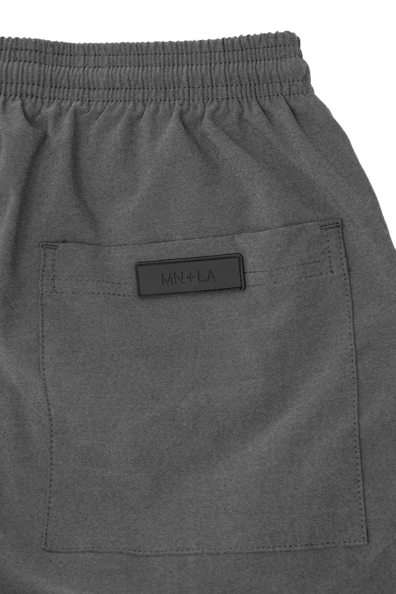 PLEATED HOUSE SHORTS IN STONE GREY